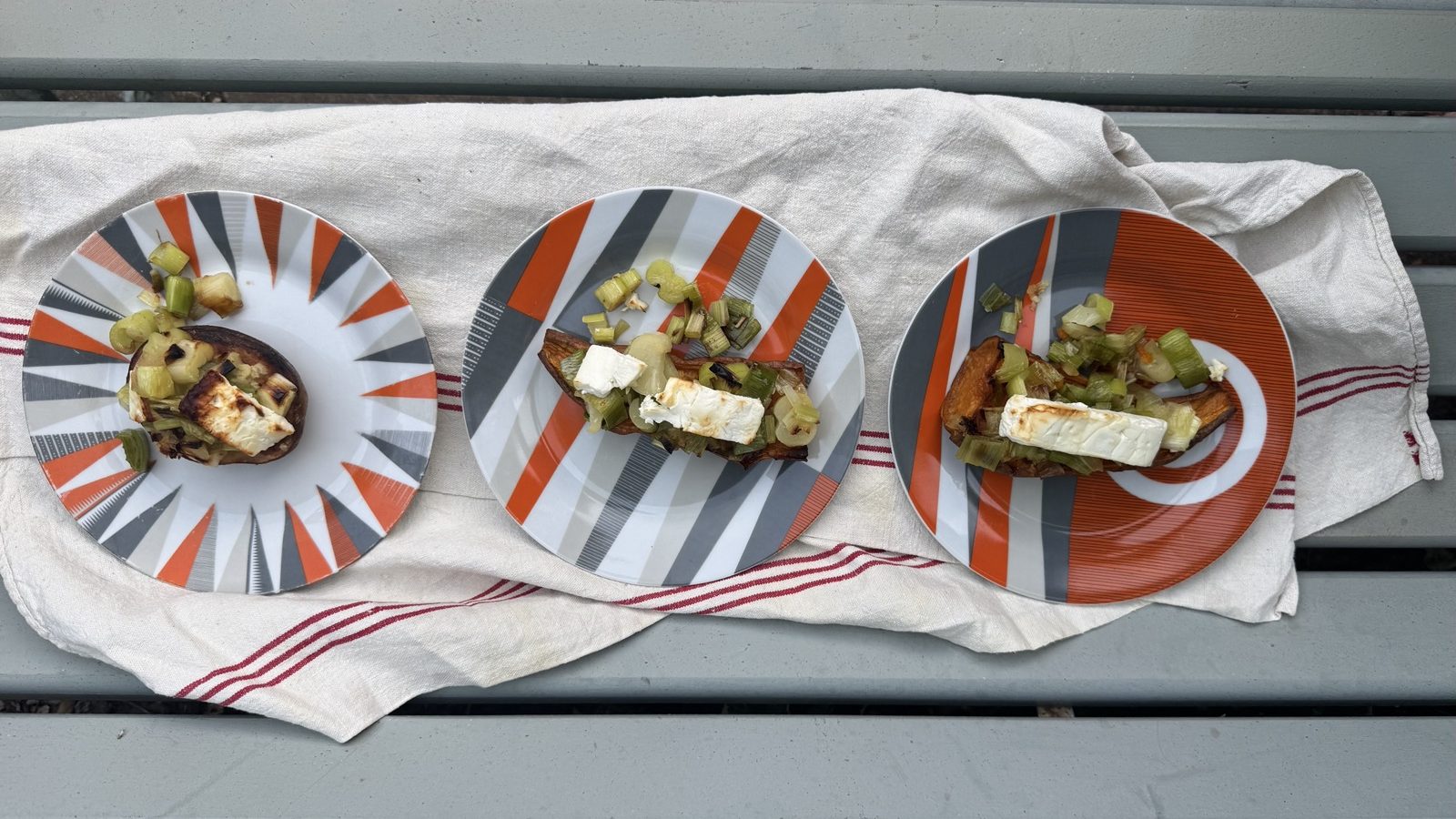 roasted sweet potatoes topped with leeks and feta