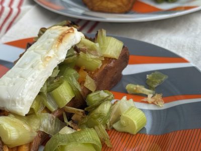 roasted sweet potatoes topped with leeks and feta