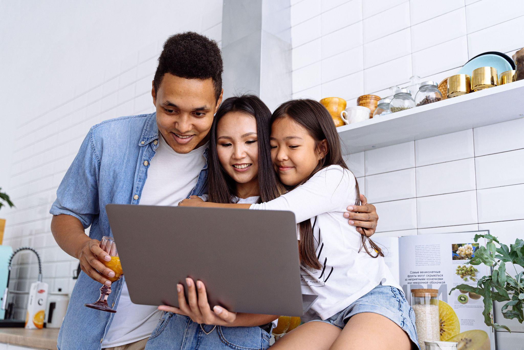 family with laptop